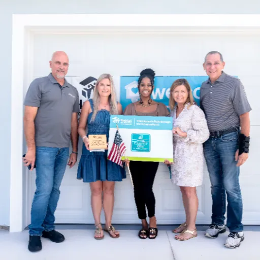 Group shot of Taylor Carpet One & Habitat for Humanity